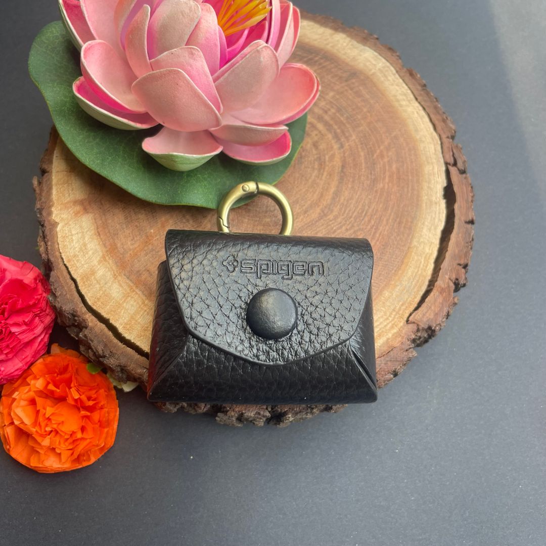 Royal leather AirPods case with golden ring in black, side view