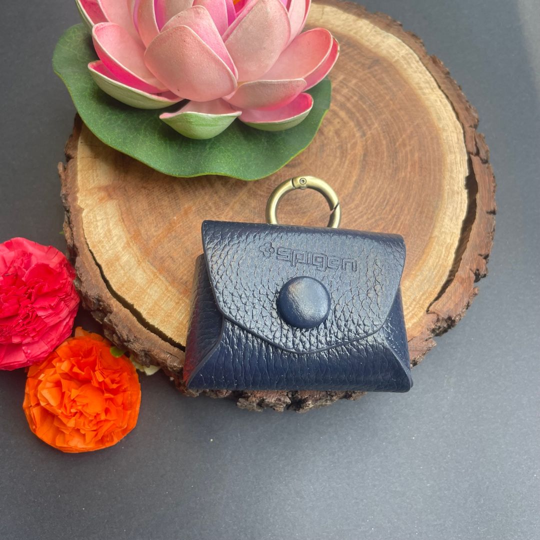 Royal leather AirPods case with golden ring in blue