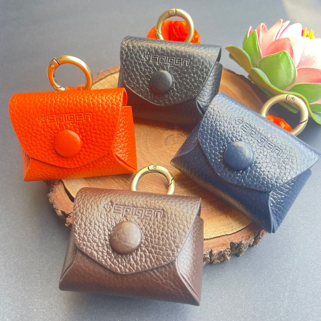 Royal leather AirPods case open showing AirPods Pro inside